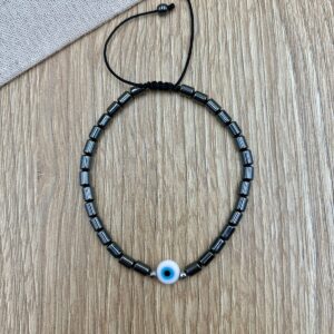 Βραχιολι αντρικο με αιματιτες και ματακι